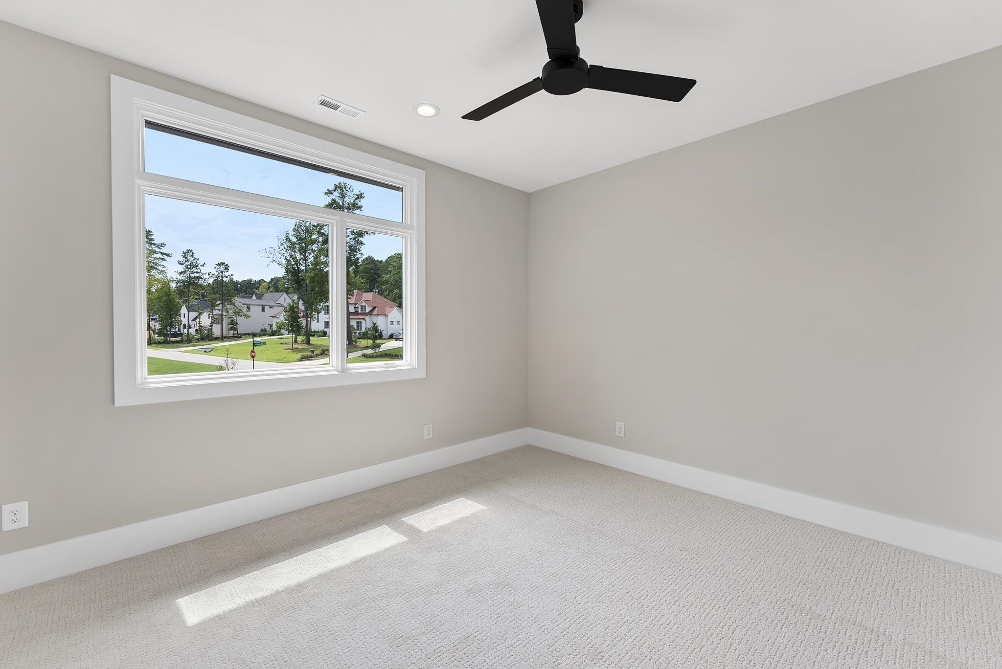 1001 Enchanted Pine Lane Raleigh, NC 27614 - Photo 47 of 52 a view of an empty room with a window