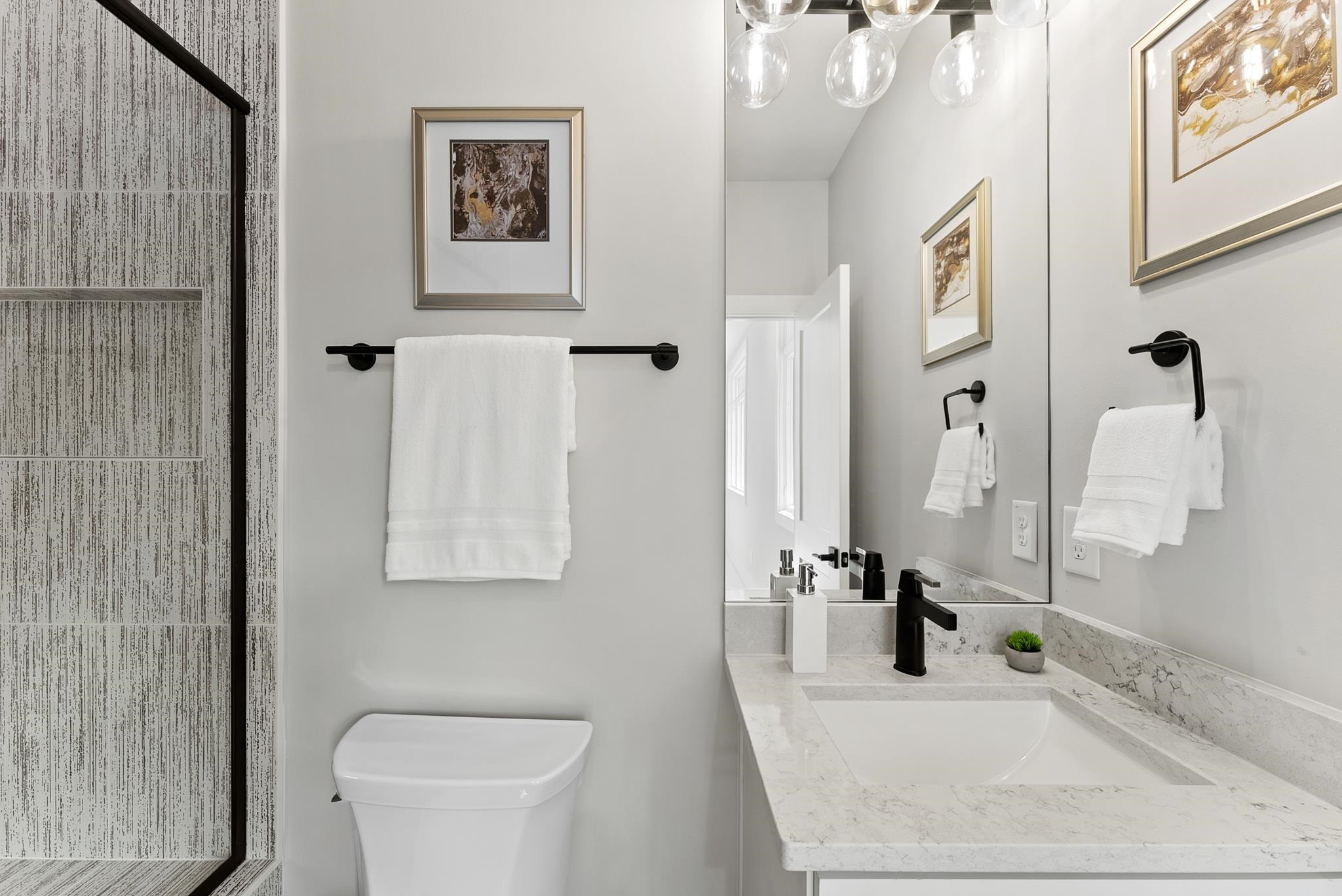 1001 Enchanted Pine Lane Raleigh, NC 27614 - Photo 49 of 52 a bathroom with a granite countertop sink a toilet and a mirror