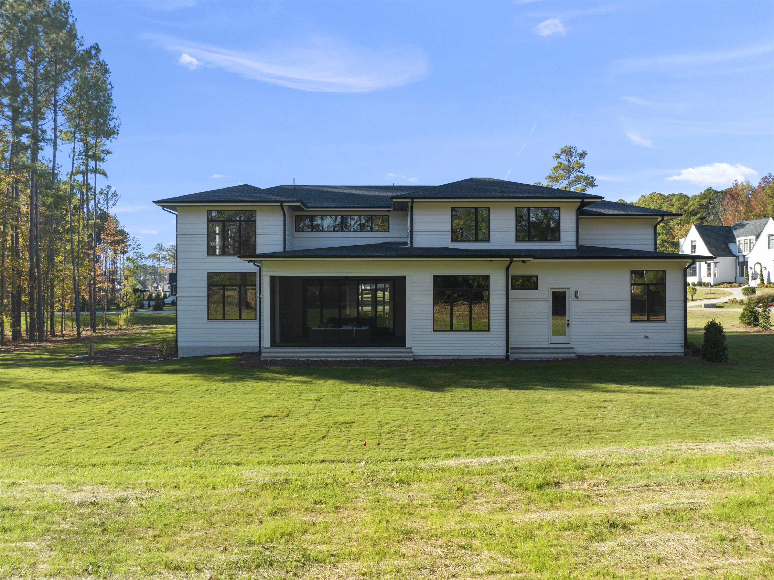 1001 Enchanted Pine Lane Raleigh, NC 27614 - Photo 5 of 52 a front view of a house with a yard