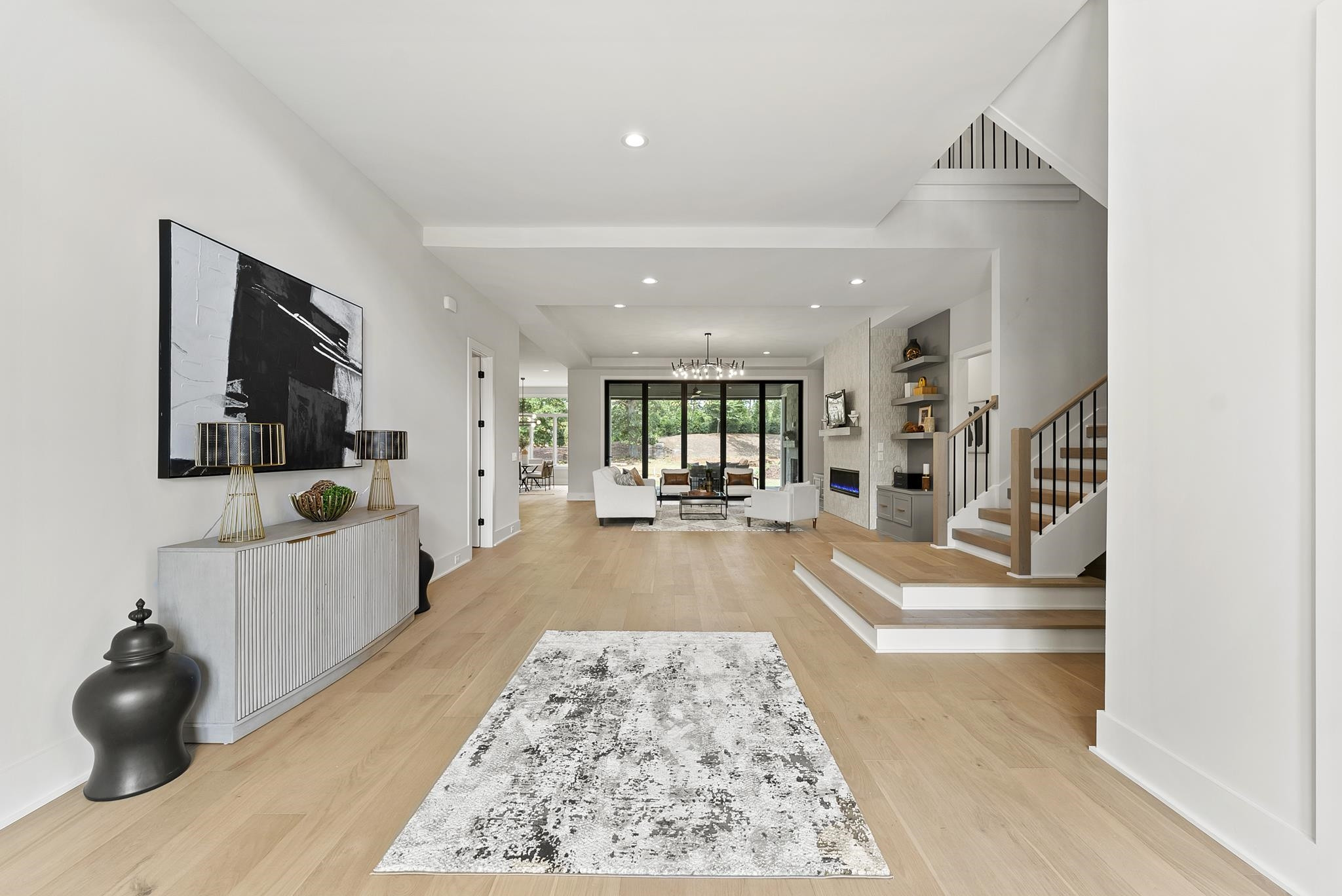 1001 Enchanted Pine Lane Raleigh, NC 27614 - Photo 6 of 52 a living room with furniture and a flat screen tv