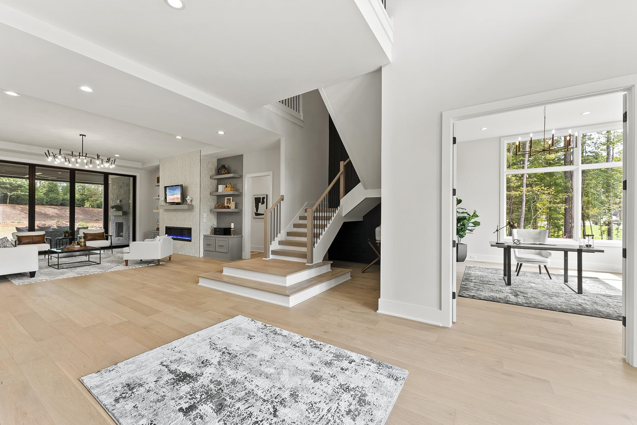 1001 Enchanted Pine Lane Raleigh, NC 27614 - Photo 7 of 52 a view of a livingroom with furniture and staircase