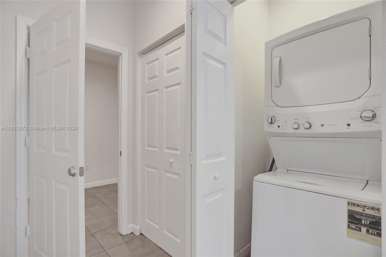 588 Southeast 35th Terrace Homestead, FL 33033 - Photo 11 of 37 a view of a hallway with washer and dryer