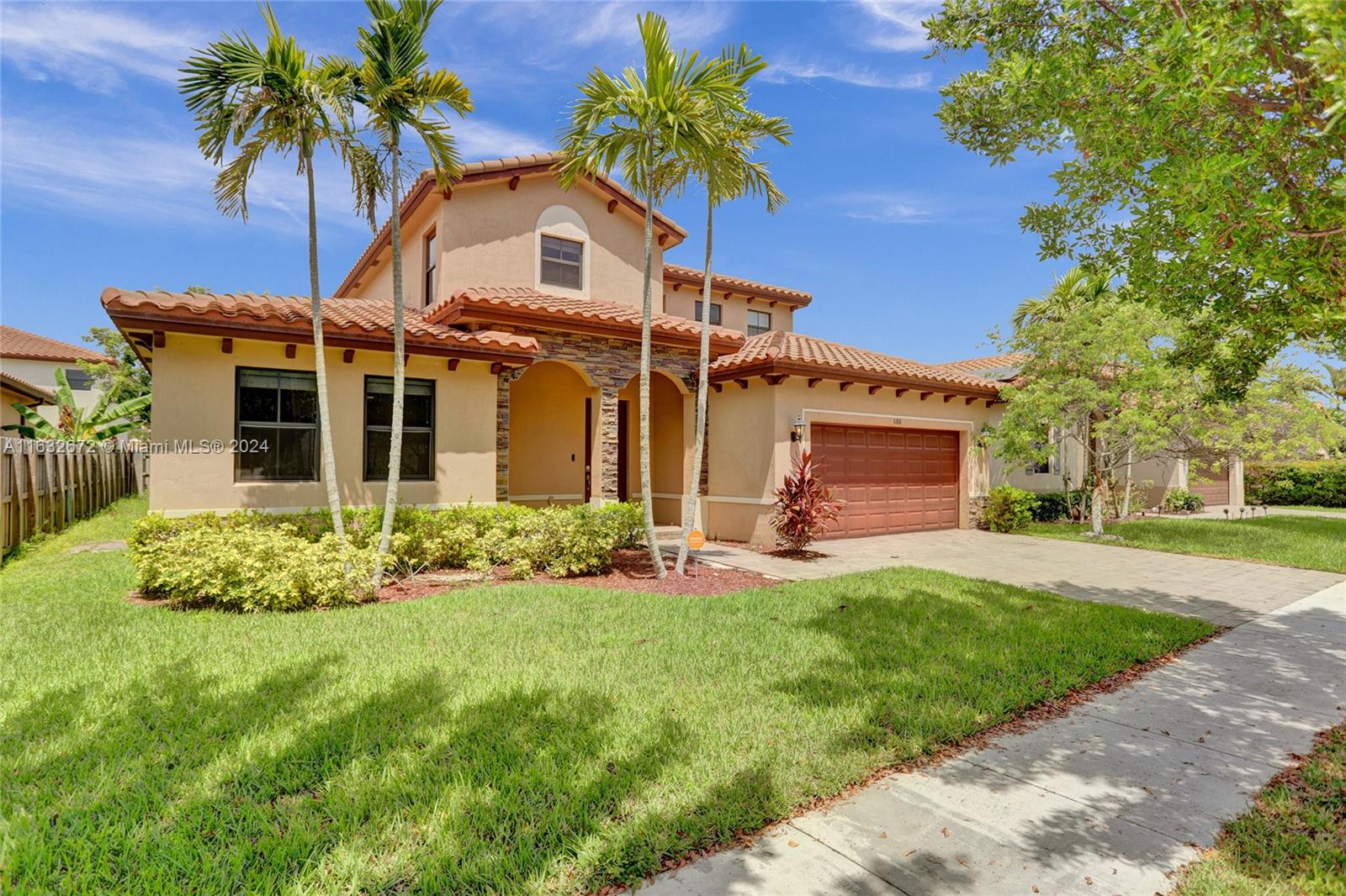 588 Southeast 35th Terrace Homestead, FL 33033 - Photo 2 of 37 front view of a house with a yard