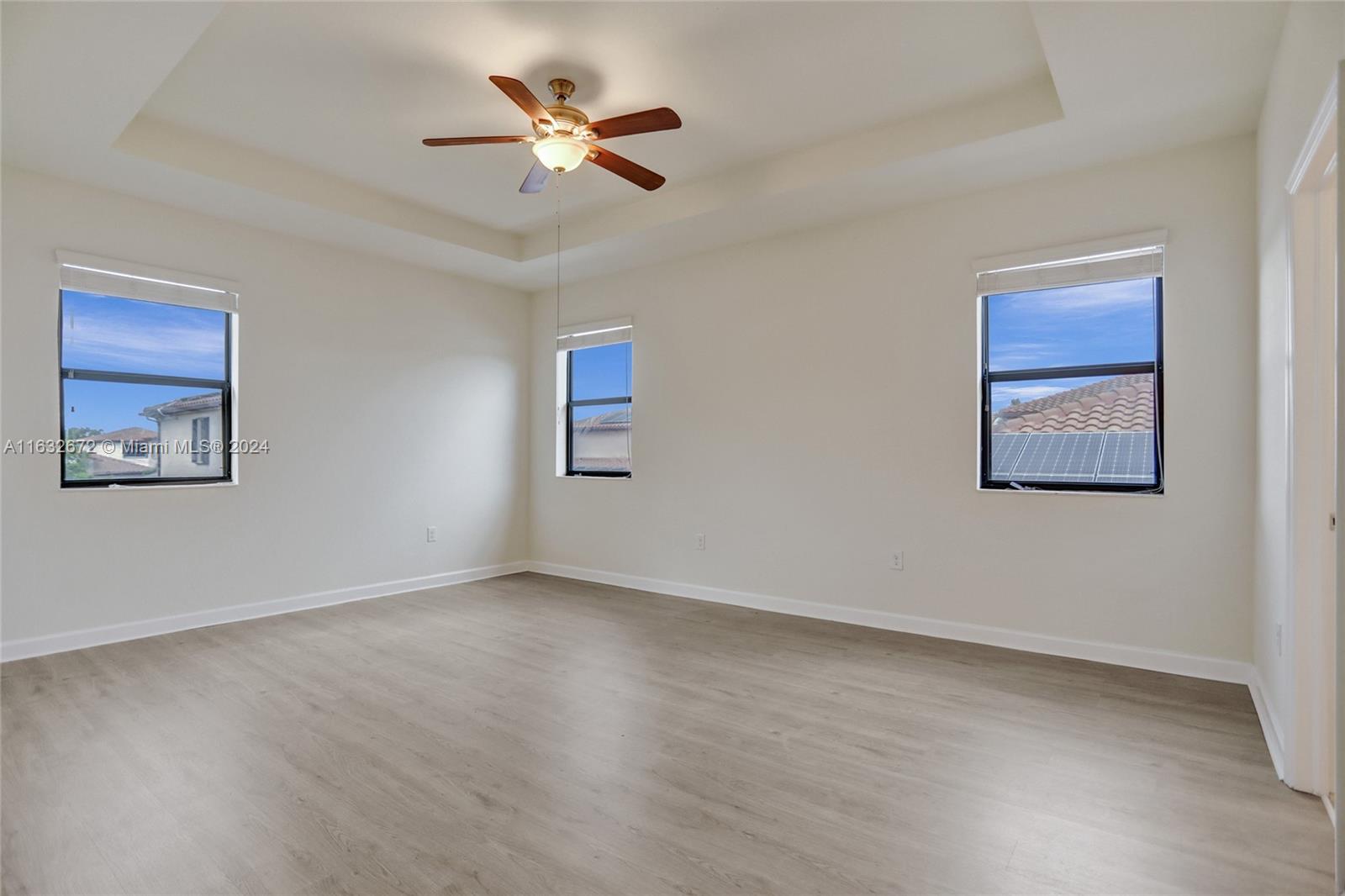 588 Southeast 35th Terrace Homestead, FL 33033 - Photo 21 of 37 a view of an empty room with a window