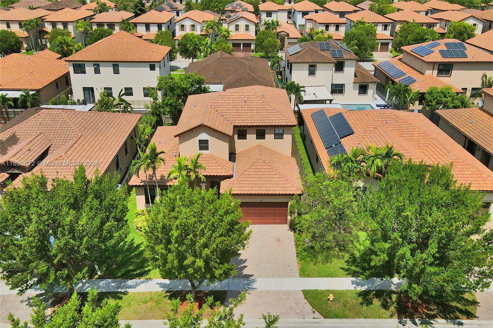 588 Southeast 35th Terrace Homestead, FL 33033 - Photo 34 of 37 an aerial view of a house with garden space and a street view