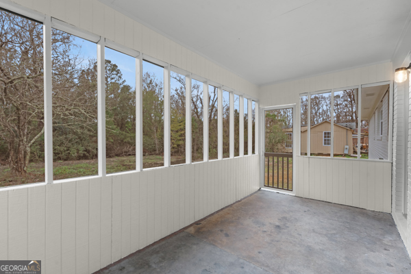 529 College Heights Road Portal, GA 30450 - Photo 7 of 23 a view of an empty room with a window