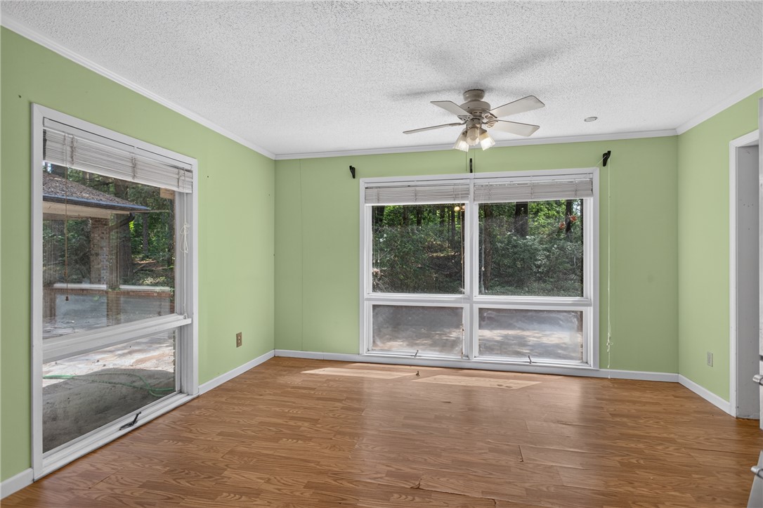123 Robin Road Westminster, SC 29693 - Photo 20 of 50 This living area offers warm flooring, overhead lighting, and abundant natural light.