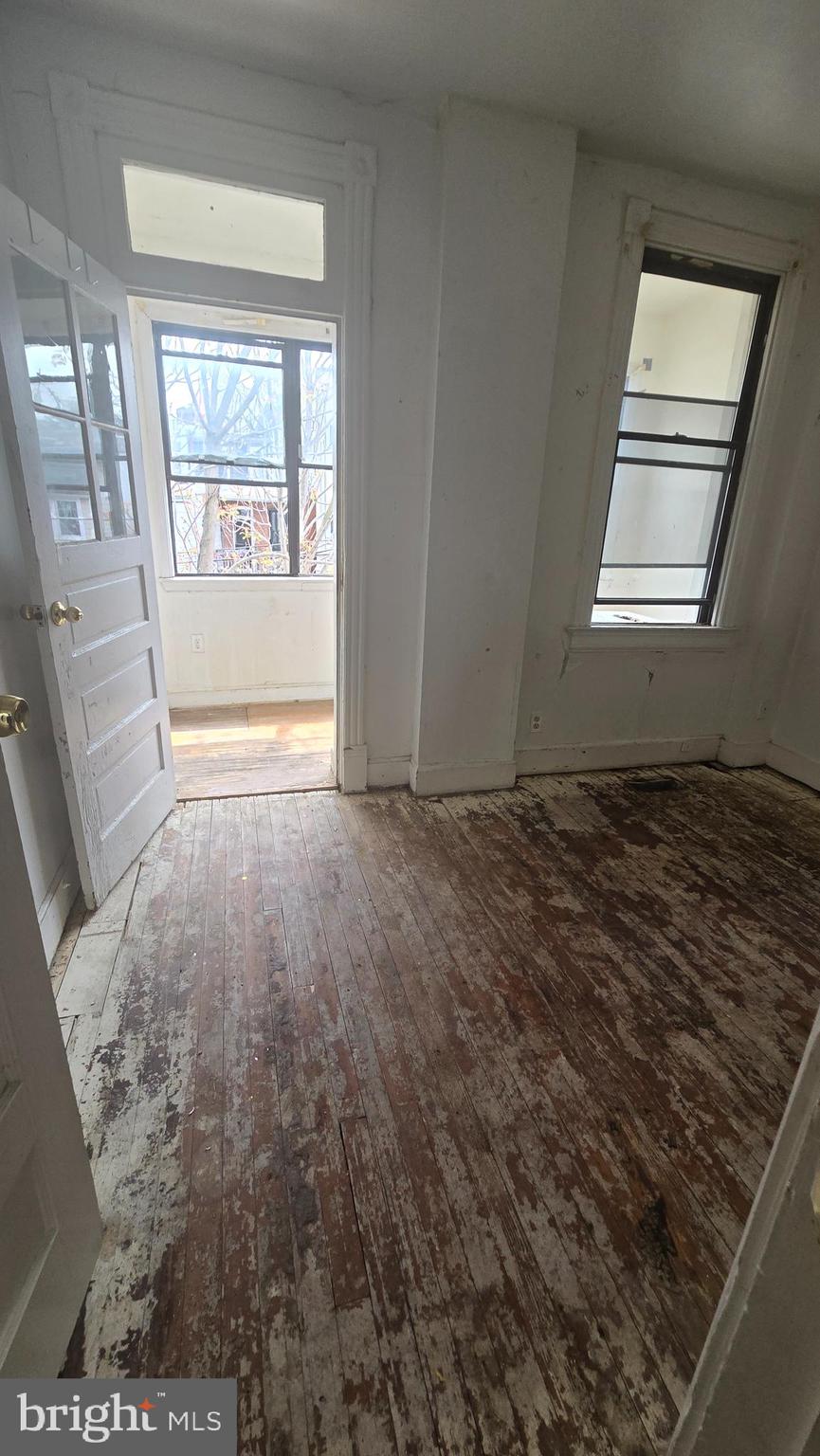 1126 Park Road Northwest Washington, DC 20010 - Photo 5 of 8 a view of an empty room and a window