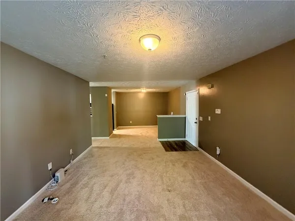 a view of a livingroom with a staircase