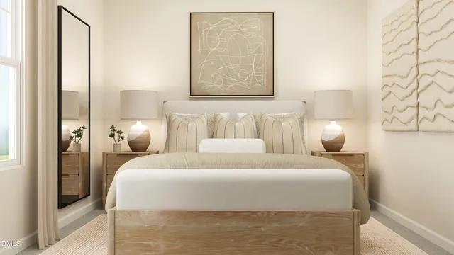 a bedroom with a bed and lamp