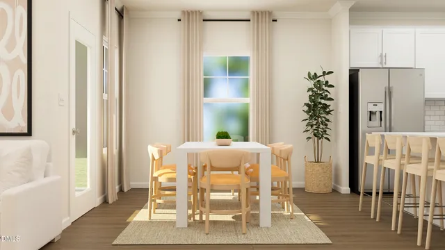 a dining room with furniture and wooden floor