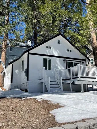 a front view of a house with garage