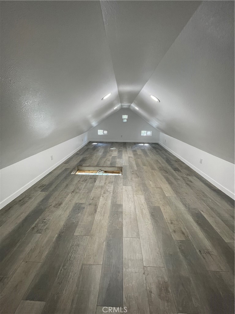 2588 Secret Drive Running Springs, CA 92382 - Photo 23 of 24 a view of empty room with wooden floor