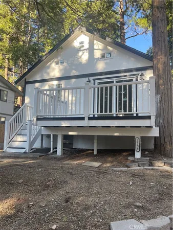 a backyard of a house with a deck