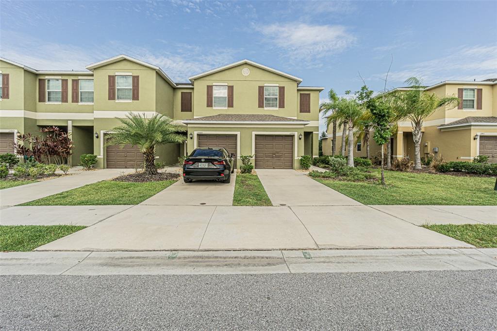 12921 Dream Catcher Way Riverview, FL 33579 - Photo 1 of 1 front view of house with a yard