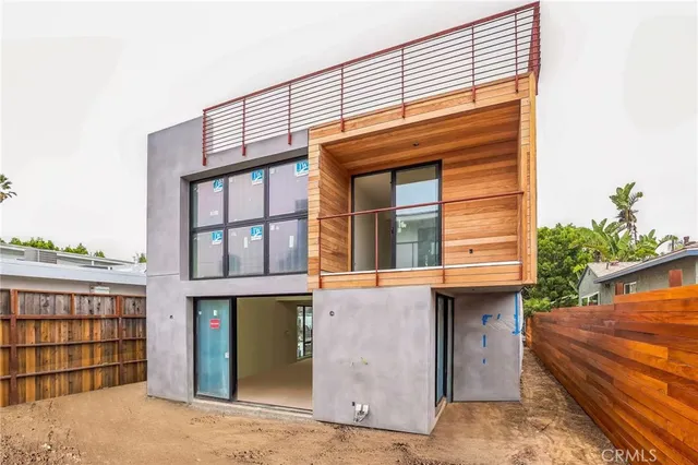 a front view of a house with a balcony