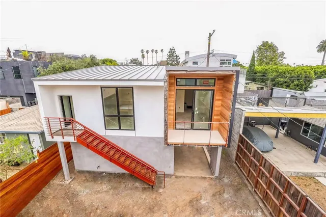 a house view with a outdoor space