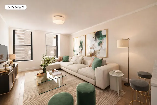 a living room with furniture kitchen view and a potted plant