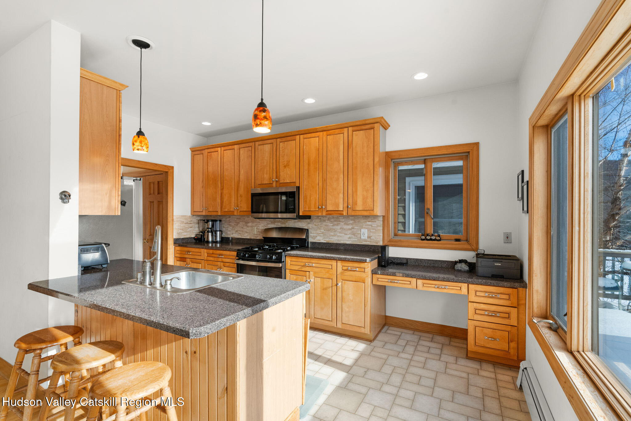 2 Biff Andrus Road Windham, NY 12496 - Photo 11 of 35 a kitchen with stainless steel appliances a stove sink microwave and cabinets