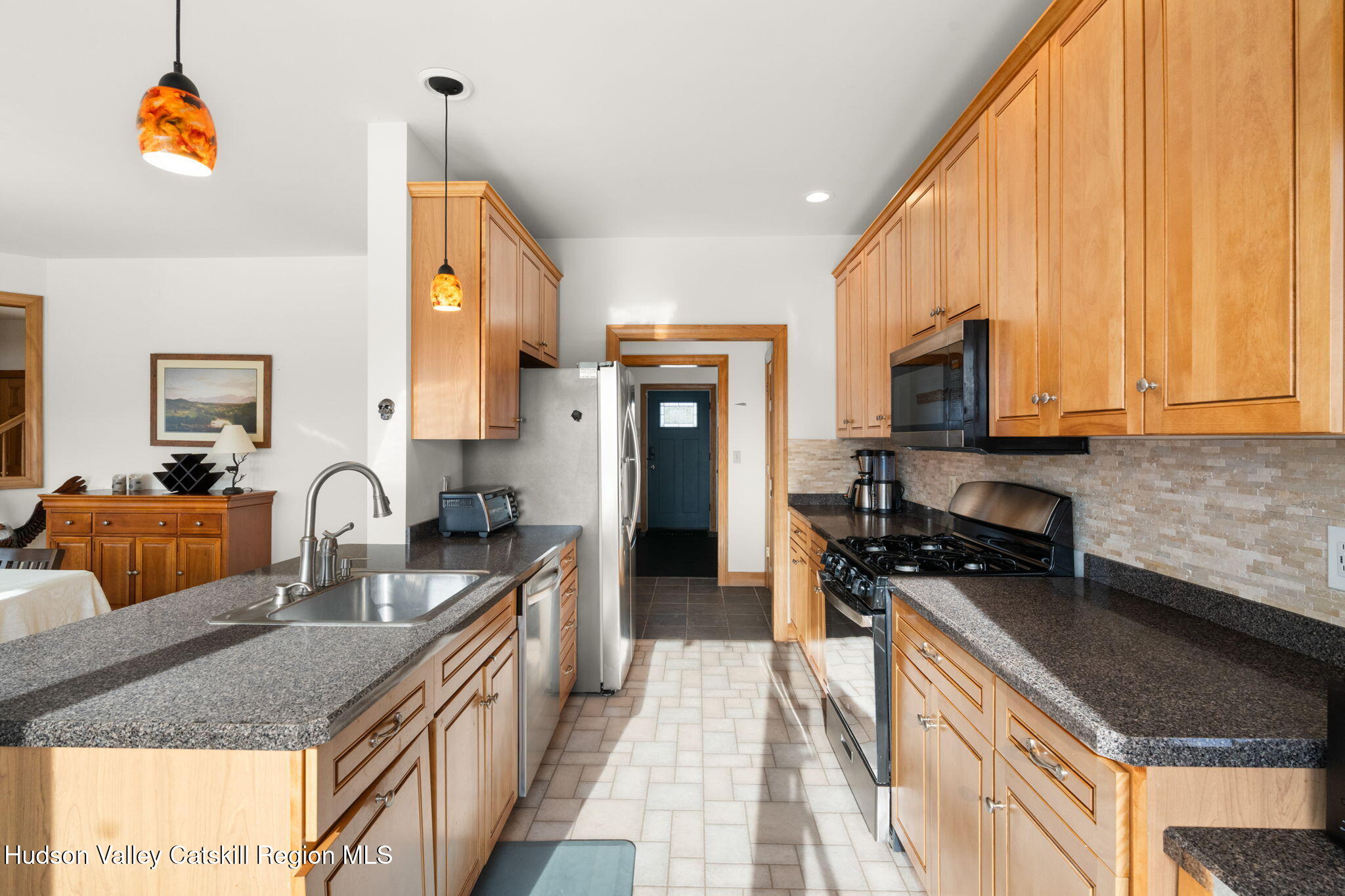 2 Biff Andrus Road Windham, NY 12496 - Photo 12 of 35 a kitchen with granite countertop a sink a counter top space appliances and cabinets