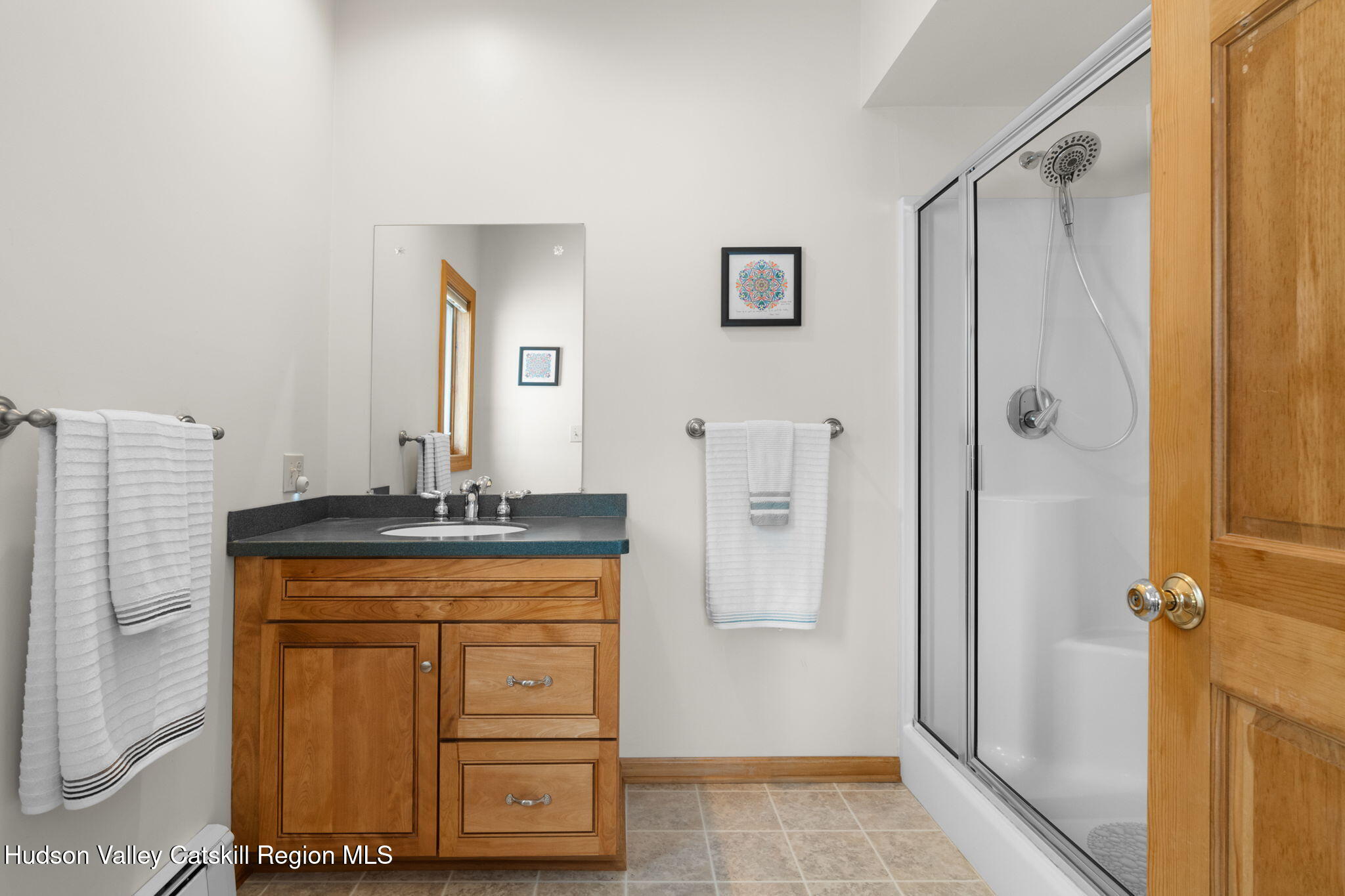 2 Biff Andrus Road Windham, NY 12496 - Photo 30 of 35 a bathroom with a granite countertop sink a mirror and a