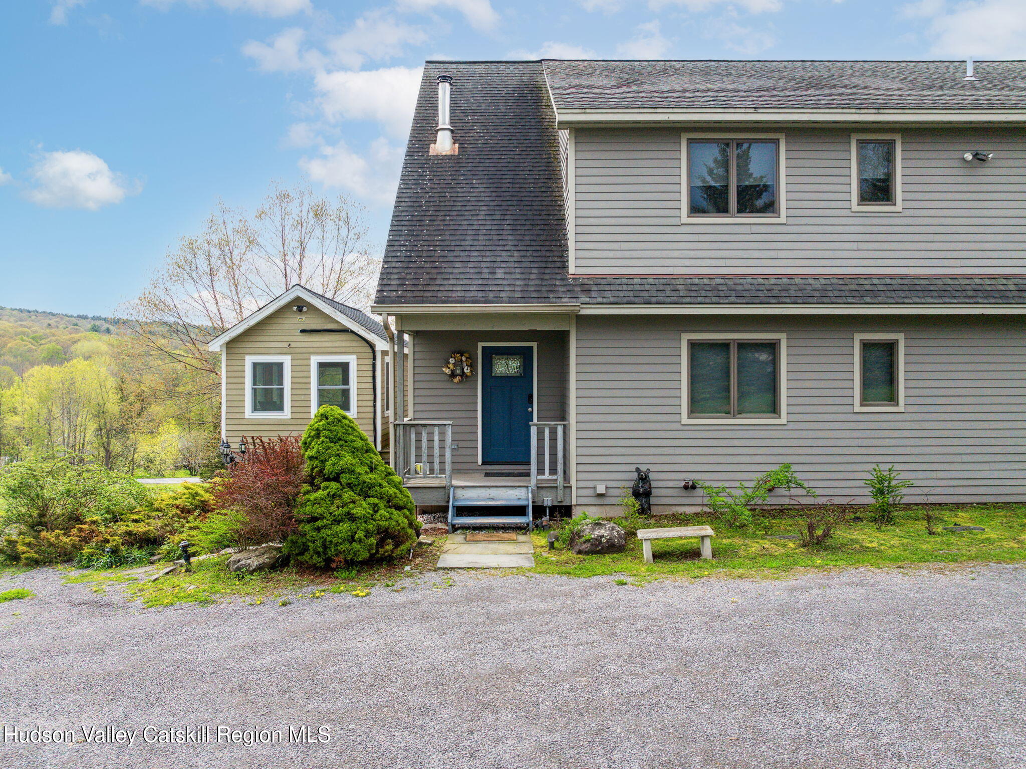 2 Biff Andrus Road Windham, NY 12496 - Photo 3 of 35 a front view of a house with a yard and garage