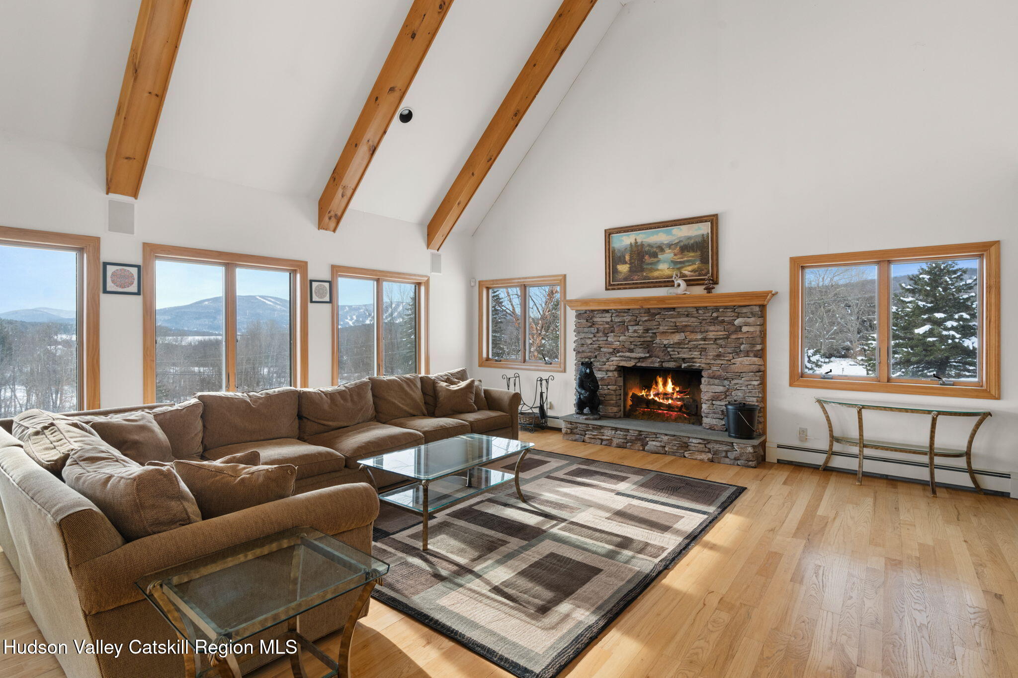 2 Biff Andrus Road Windham, NY 12496 - Photo 6 of 35 a living room with furniture and a fireplace