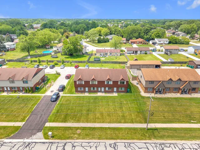 a view of a city with lawn chairs