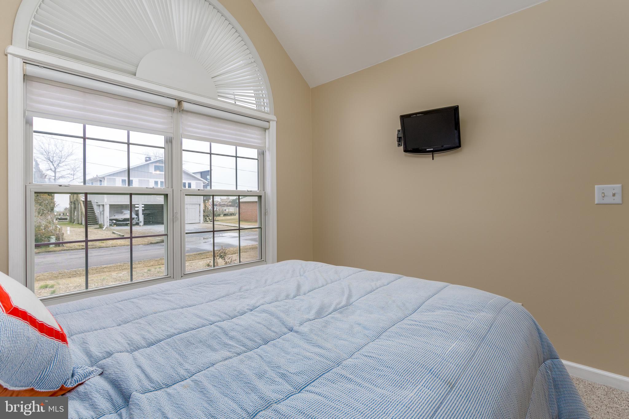 10507 Norwich Road Ocean City, MD 21842 - Photo 25 of 38 Light filled queen size bedroom