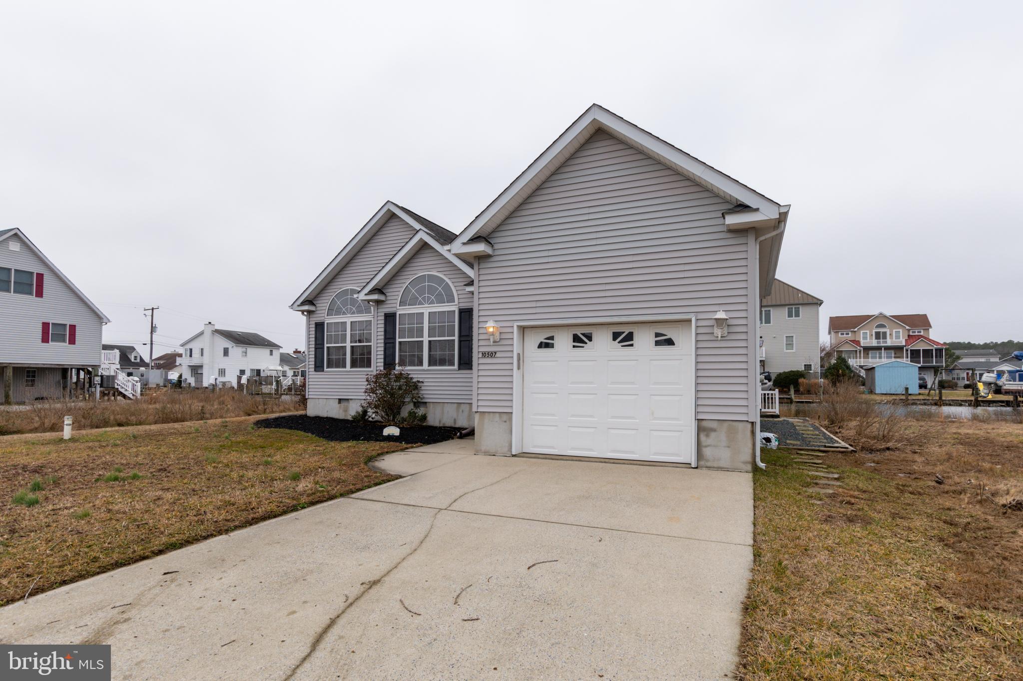 10507 Norwich Road Ocean City, MD 21842 - Photo 32 of 38 Oversized garage with 2 side pedestrian doors