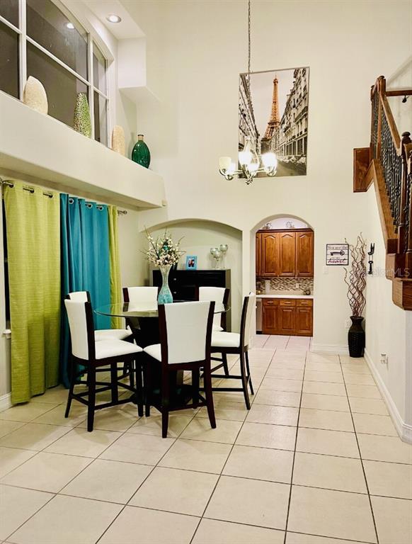 5219 Mystic Point Court Orlando, FL 32812 - Photo 7 of 13 a view of a dining room with furniture