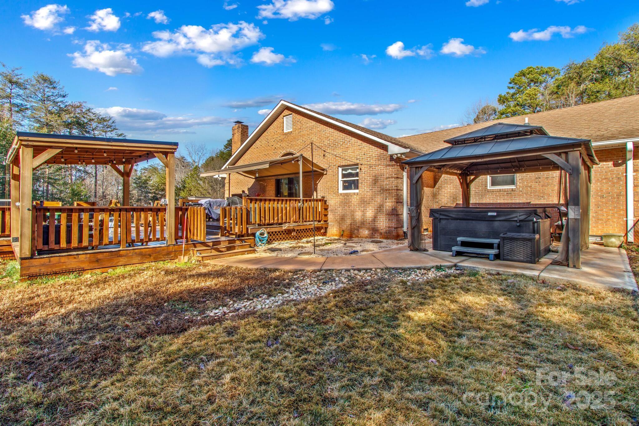 295 Rimer Road Salisbury, NC 28146 - Photo 31 of 48 a view of a house with backyard and sitting area
