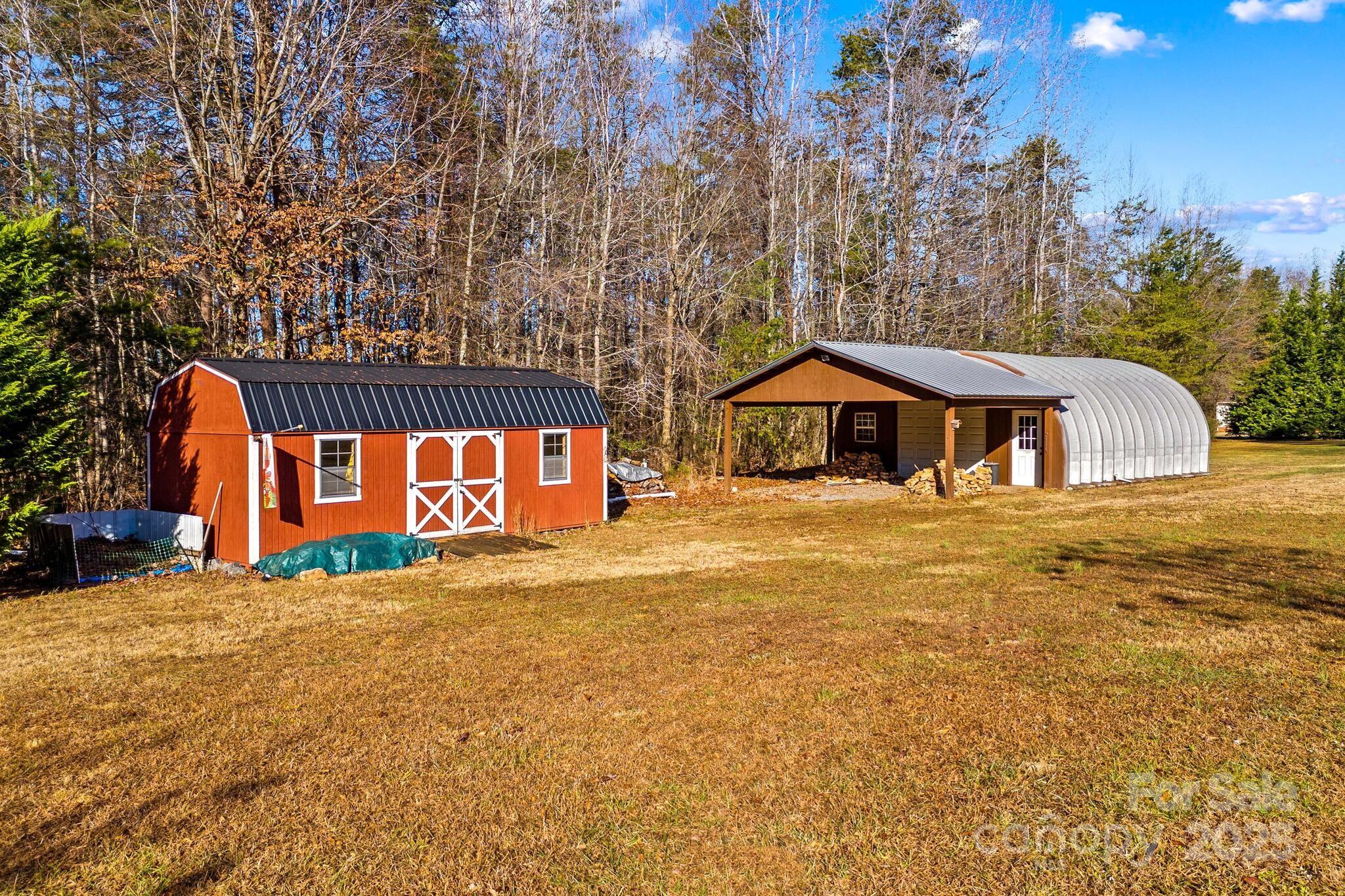 295 Rimer Road Salisbury, NC 28146 - Photo 37 of 48 a house with large trees in front of it