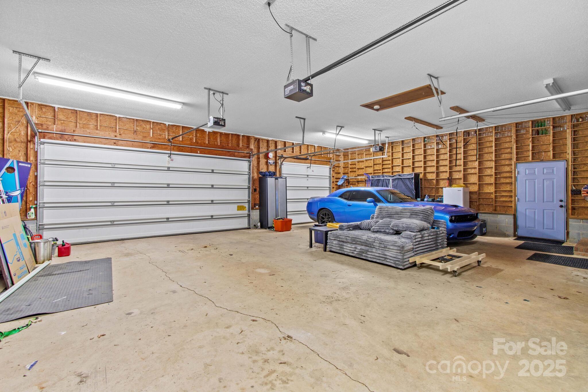 295 Rimer Road Salisbury, NC 28146 - Photo 43 of 48 a backyard of a house with barbeque oven table and chairs
