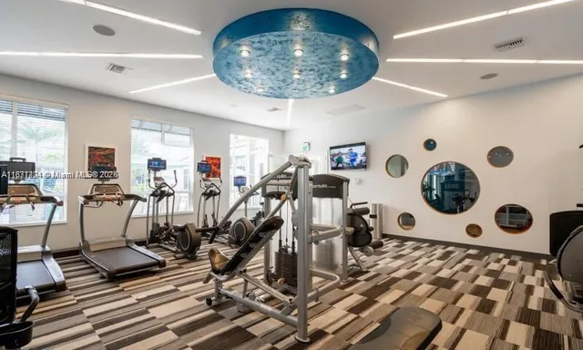 a view of a room with gym equipment