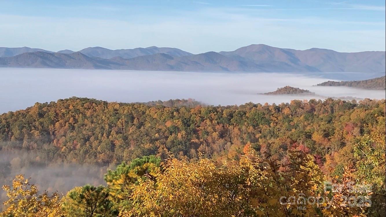 727 Chinquapin Mountain Road Franklin, NC 28734 - Photo 44 of 47 a view of mountain with sunset in background
