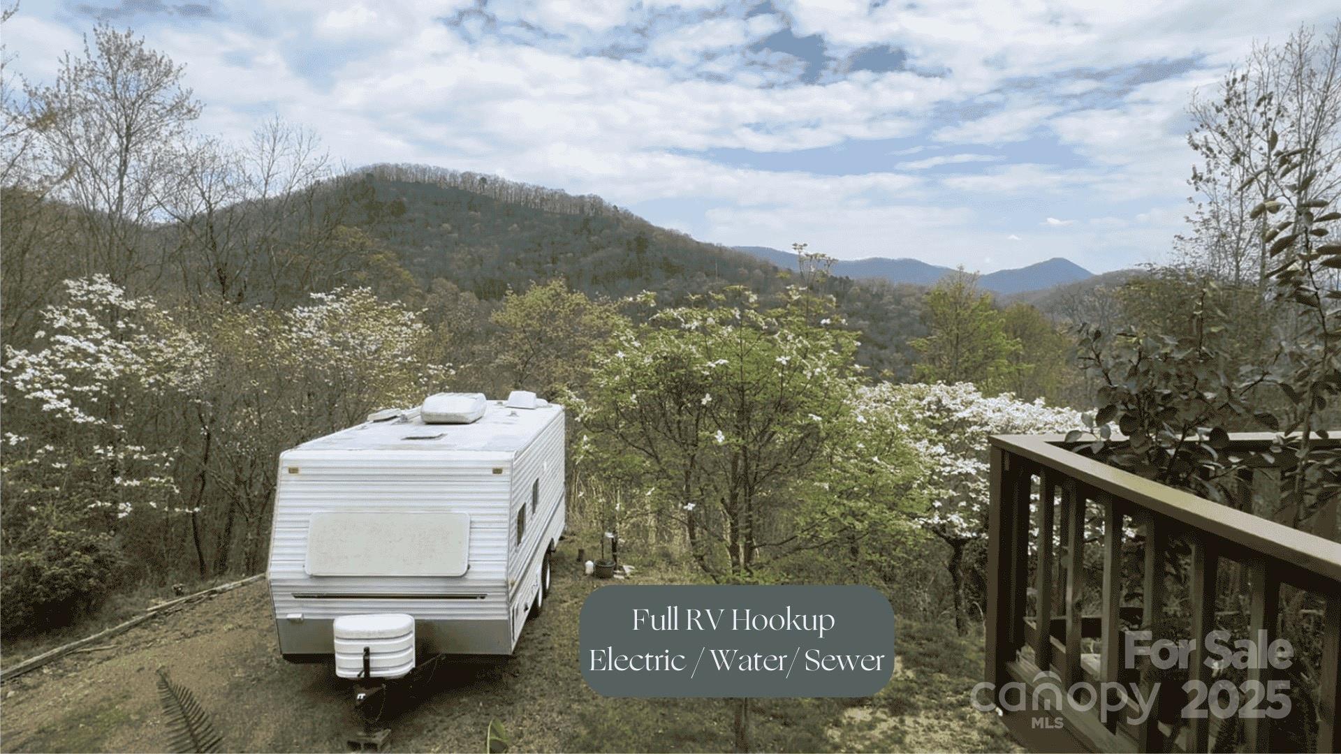 727 Chinquapin Mountain Road Franklin, NC 28734 - Photo 6 of 47 a view of a city from a balcony