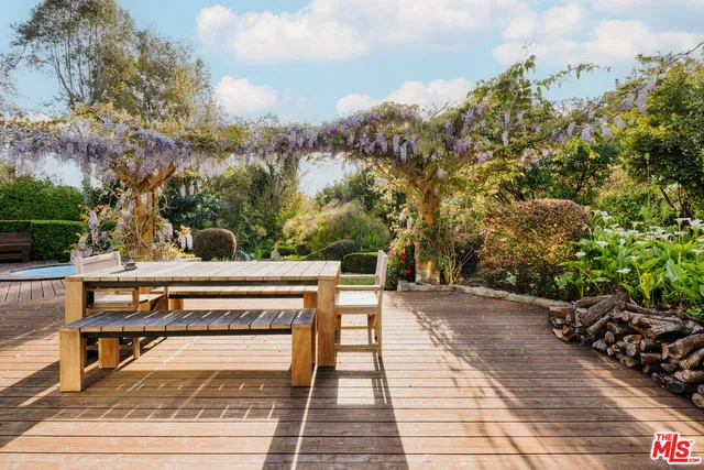 a view of a terrace with trees