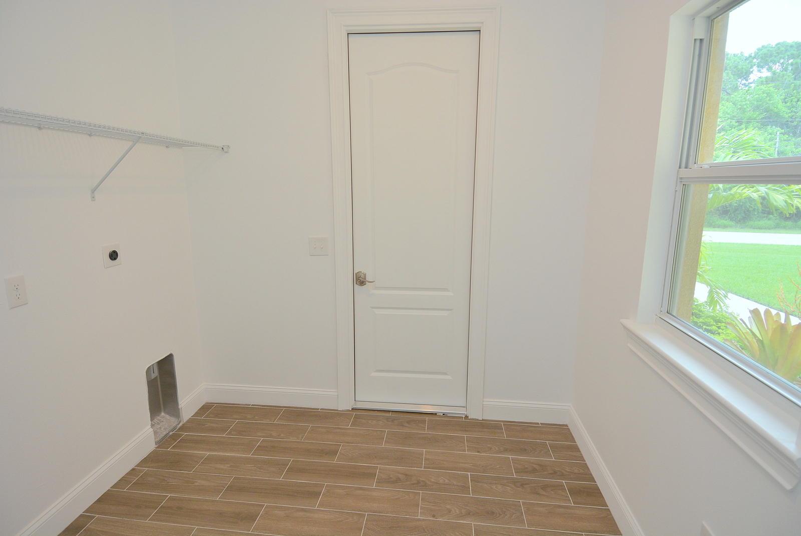 199 Southwest Ridgecrest Drive Port St. Lucie, FL 34953 - Photo 47 of 54 Laundry