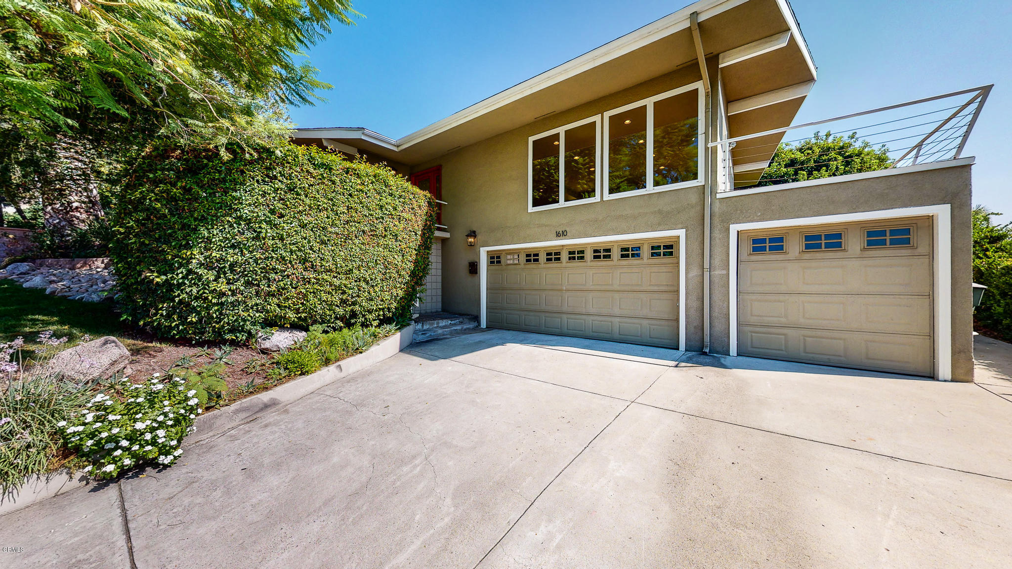 1610 Carriage House Road Pasadena, CA 91107 - Photo 1 of 54 a front view of a house with a garden