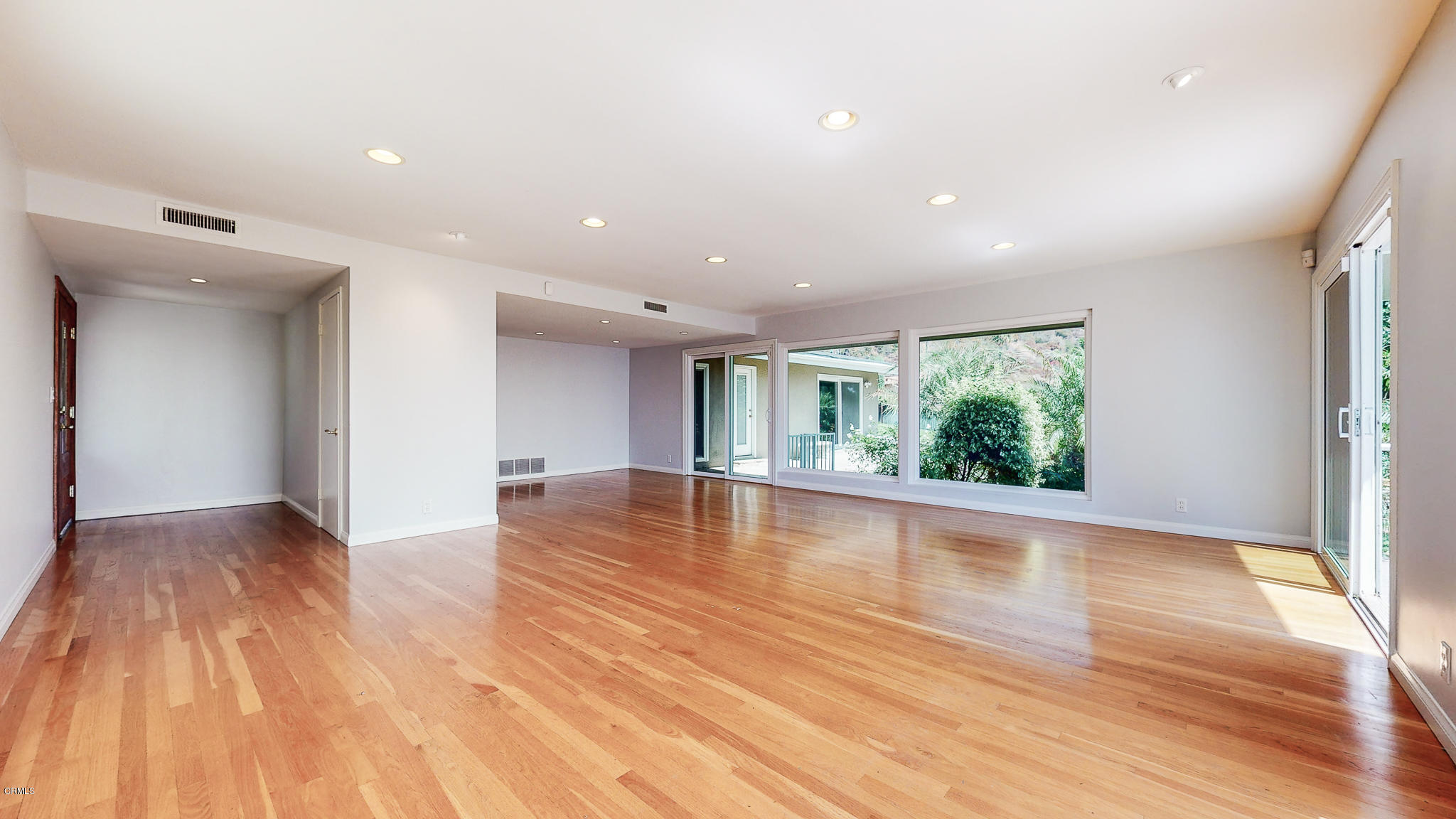 1610 Carriage House Road Pasadena, CA 91107 - Photo 15 of 54 a view of empty room with wooden floor and fan