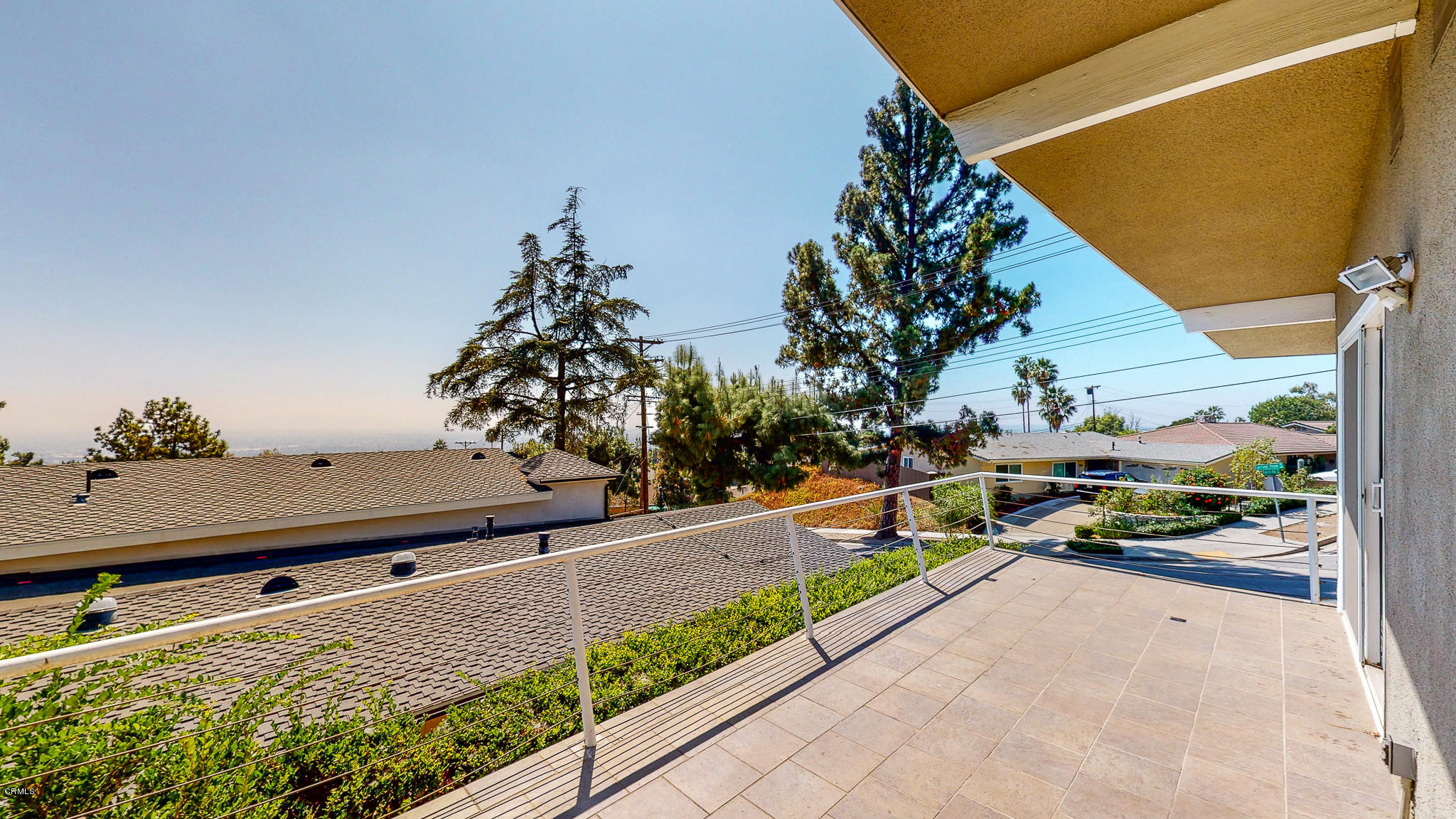 1610 Carriage House Road Pasadena, CA 91107 - Photo 20 of 54 a balcony with flower plants and wooden floor
