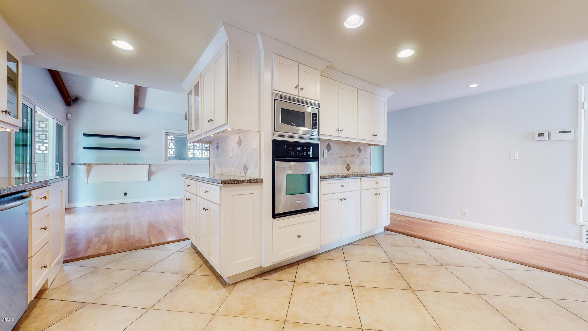 1610 Carriage House Road Pasadena, CA 91107 - Photo 26 of 54 a kitchen with stainless steel appliances granite countertop a refrigerator and a stove