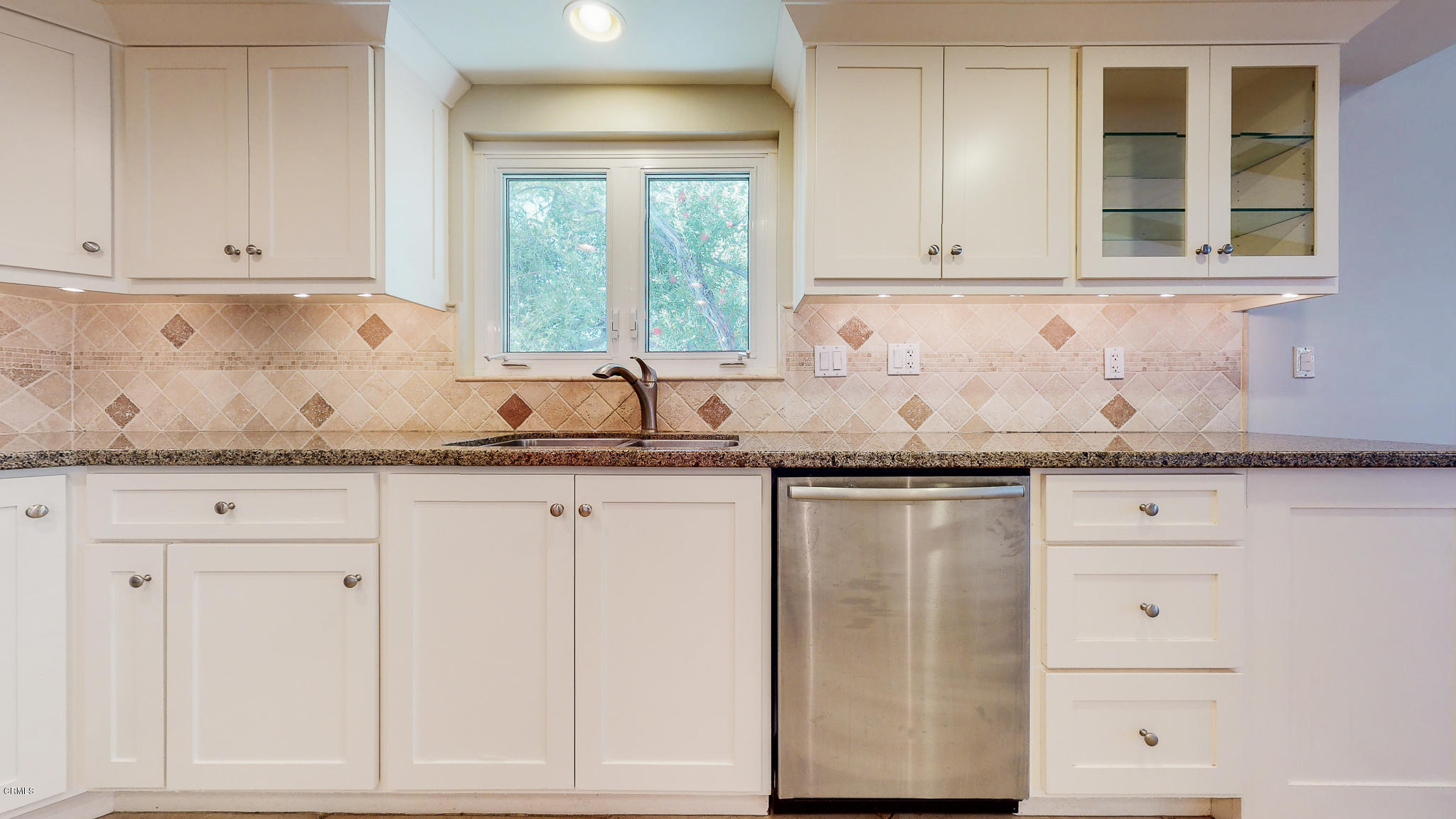 1610 Carriage House Road Pasadena, CA 91107 - Photo 30 of 54 a kitchen with granite countertop white cabinets and sink