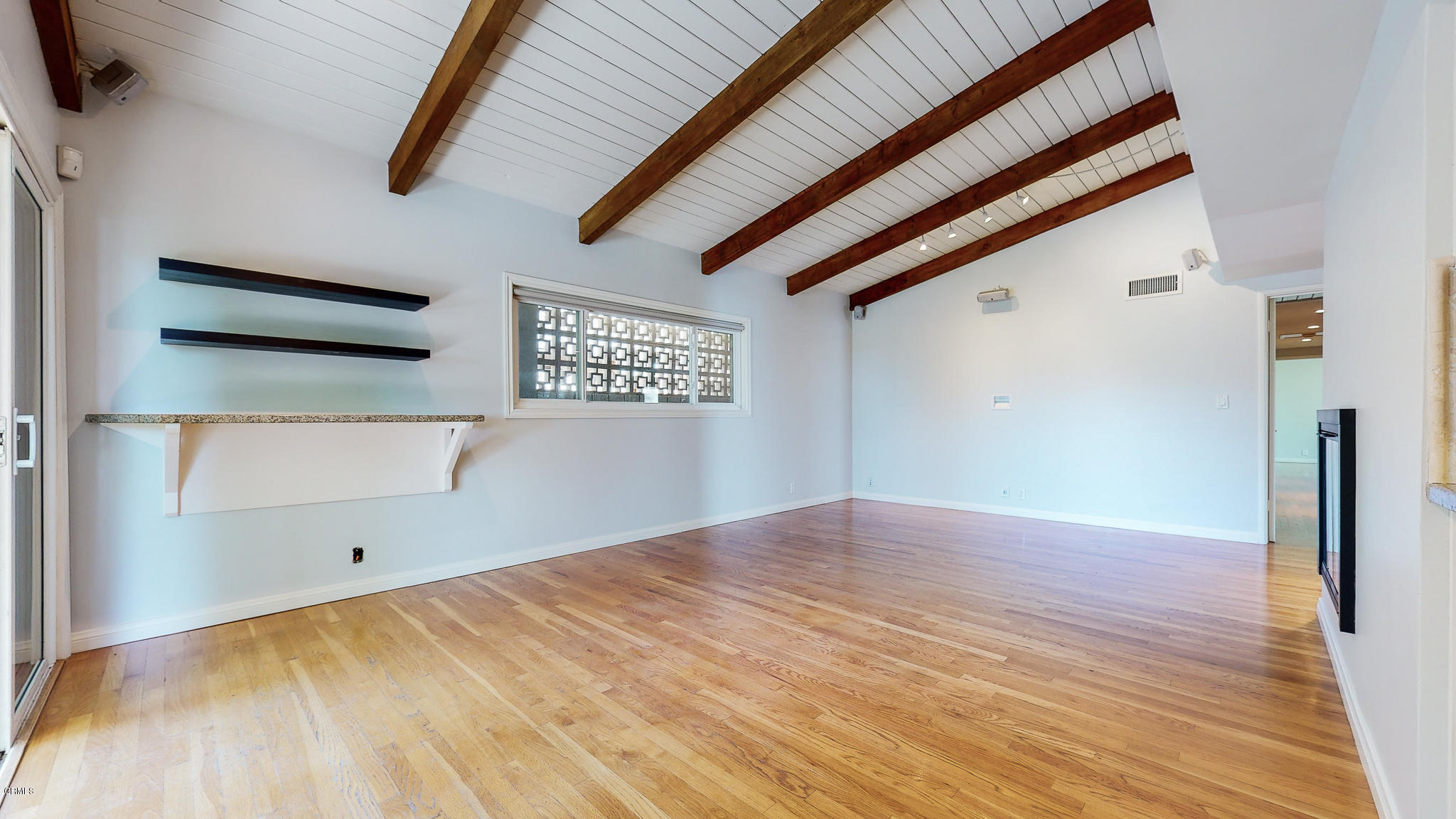 1610 Carriage House Road Pasadena, CA 91107 - Photo 32 of 54 a view of empty room with wooden floor