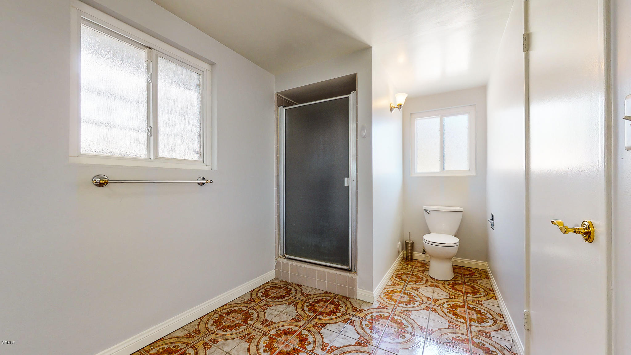 1610 Carriage House Road Pasadena, CA 91107 - Photo 40 of 54 a bathroom with a toilet and a shower