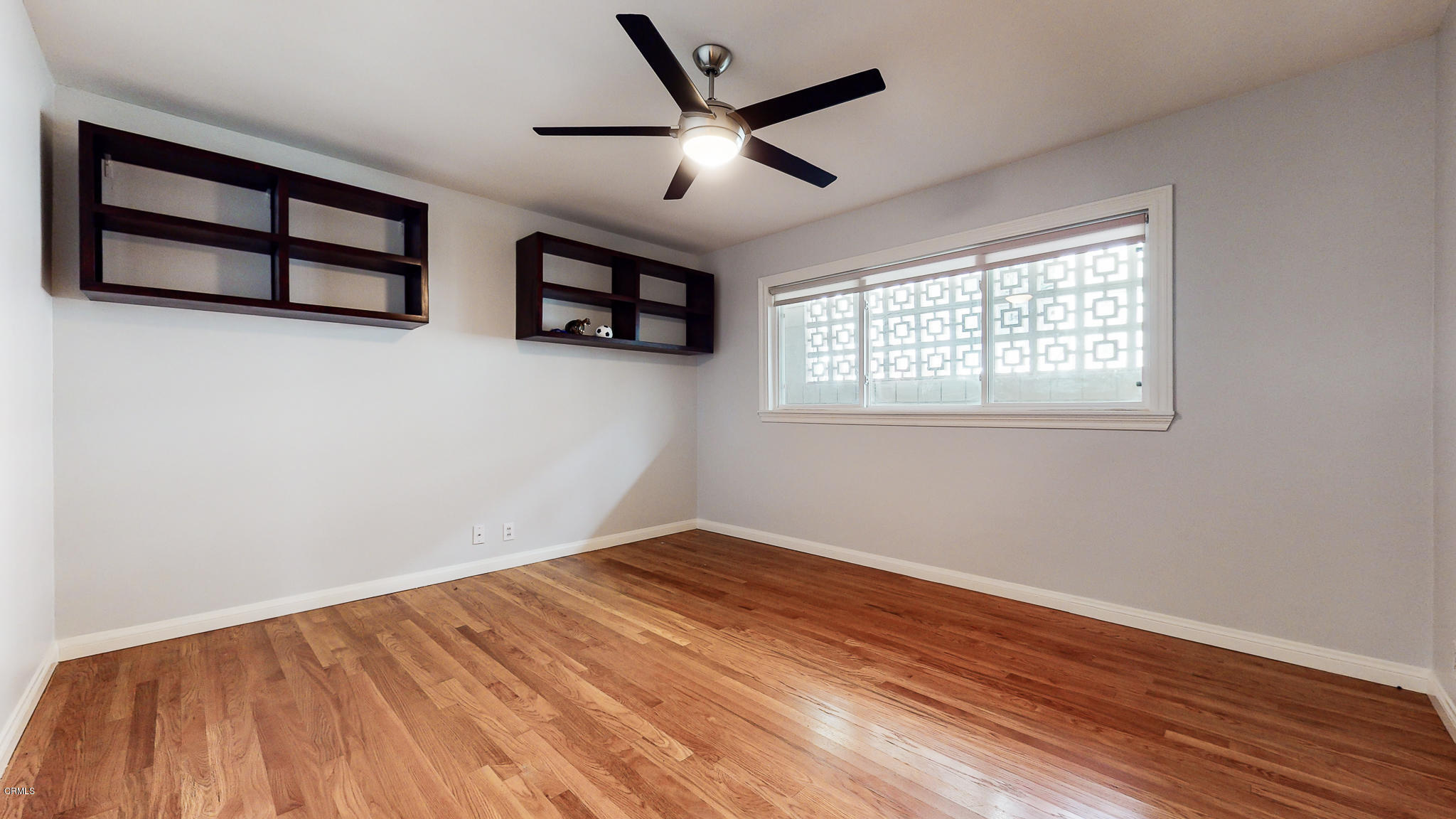 1610 Carriage House Road Pasadena, CA 91107 - Photo 44 of 54 a view of empty room with wooden floor and fan