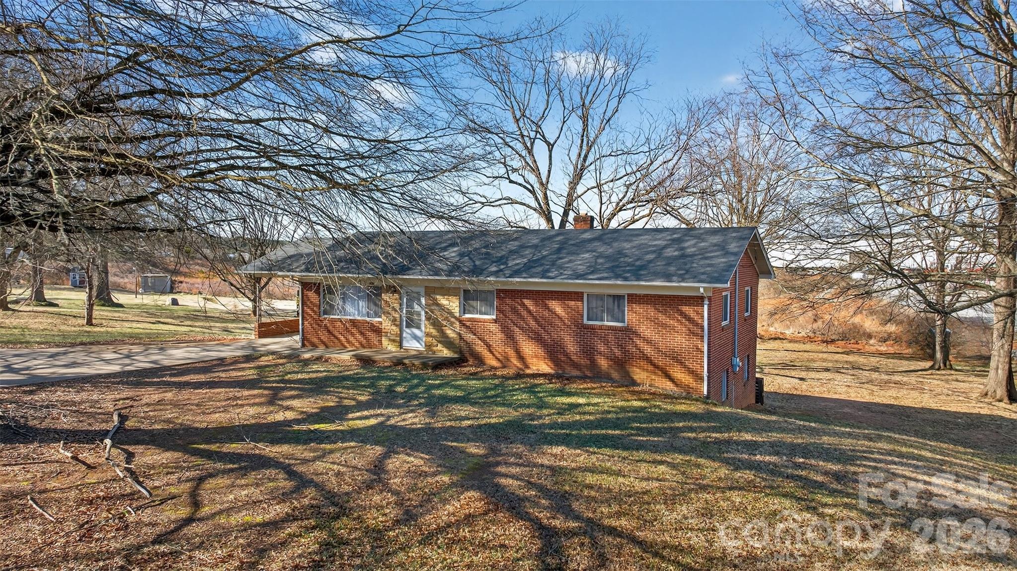 1708 Emmanuel Church Road Conover, NC 28613 - Photo 3 of 27 a view of a house with a yard