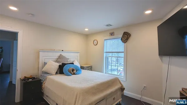 an aerial view of a house with a garden