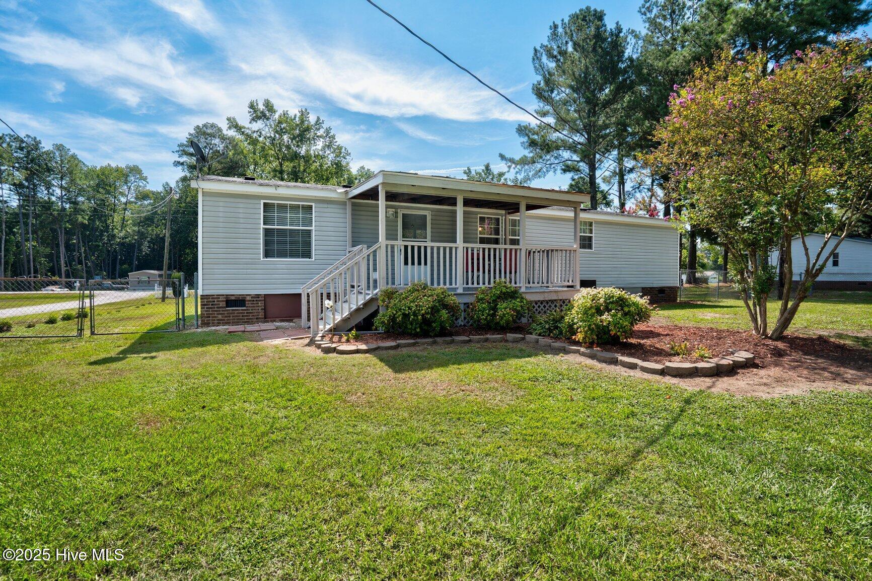 4541 Faith Baptist Church Road Pinetops, NC 27864 - Photo 24 of 29 Covered Back Porch